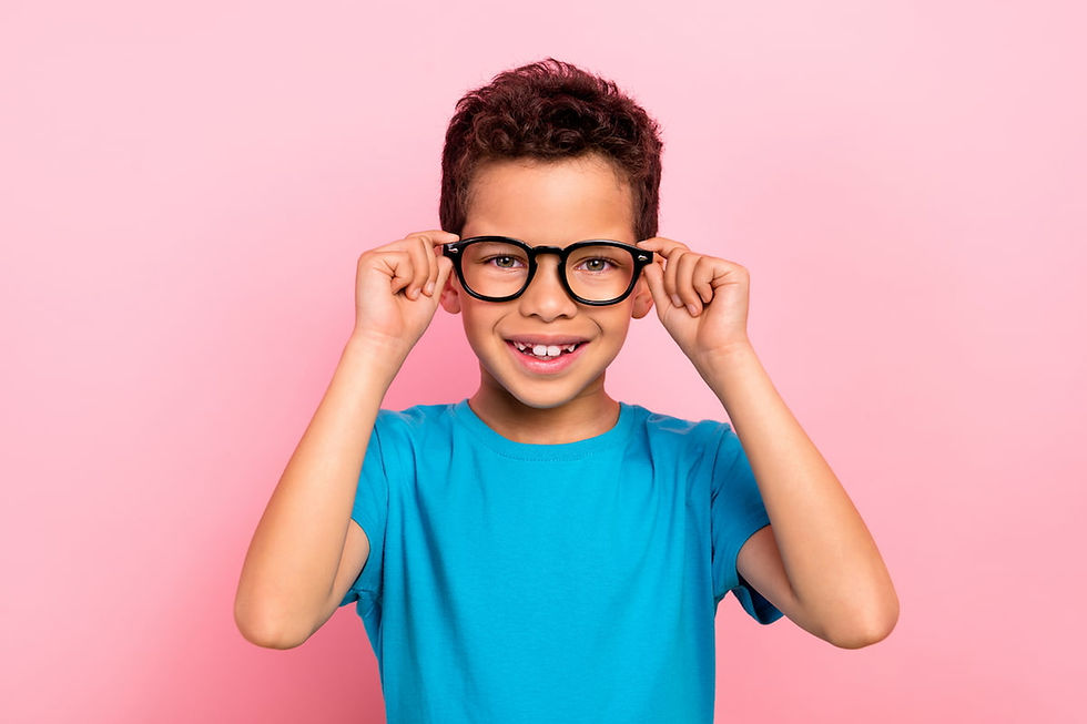 young boy wearing glasses for myopia control