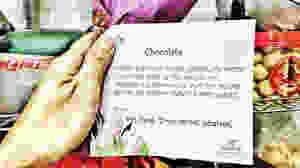 The card on the flower.