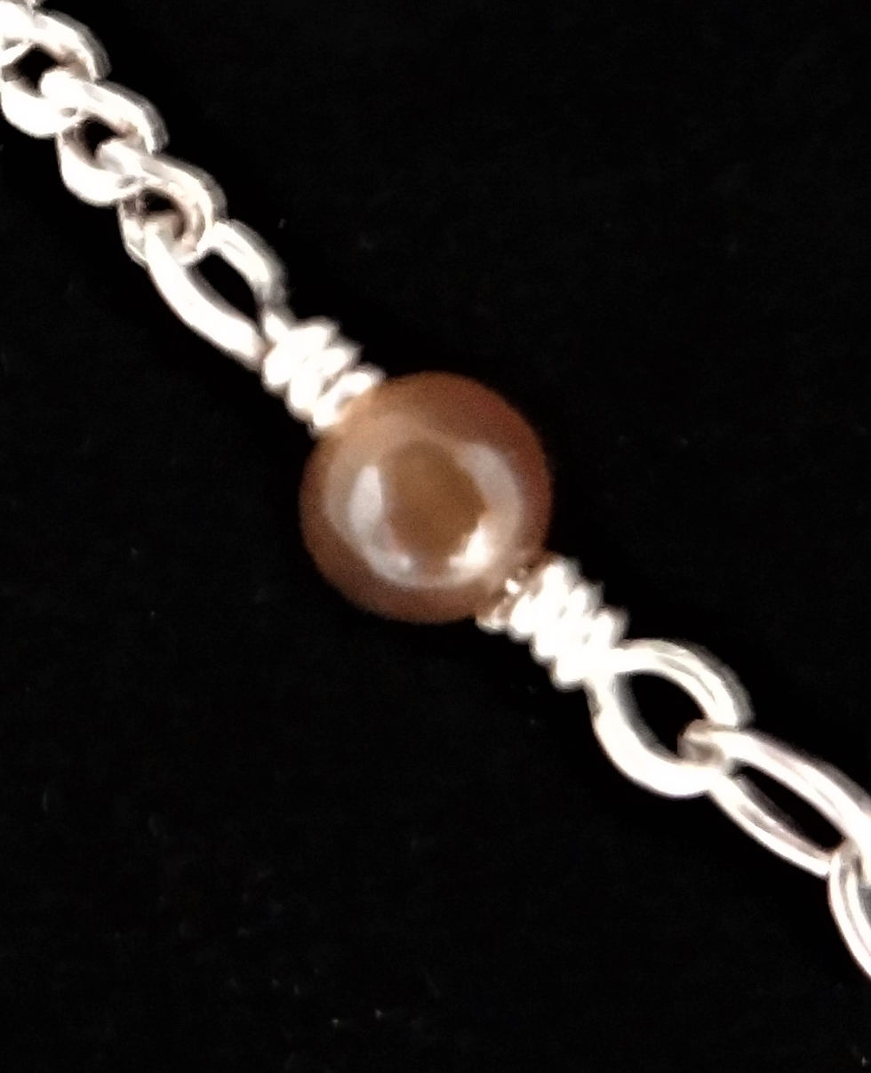 Thumbnail: "A Drop in the Ocean" pendant