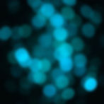 a beautiful abstract bokeh background in blues, greens, black.jpg