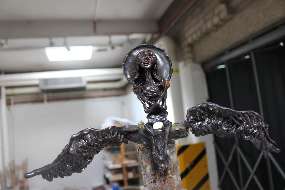 Detail of corpse angel, sword hilt