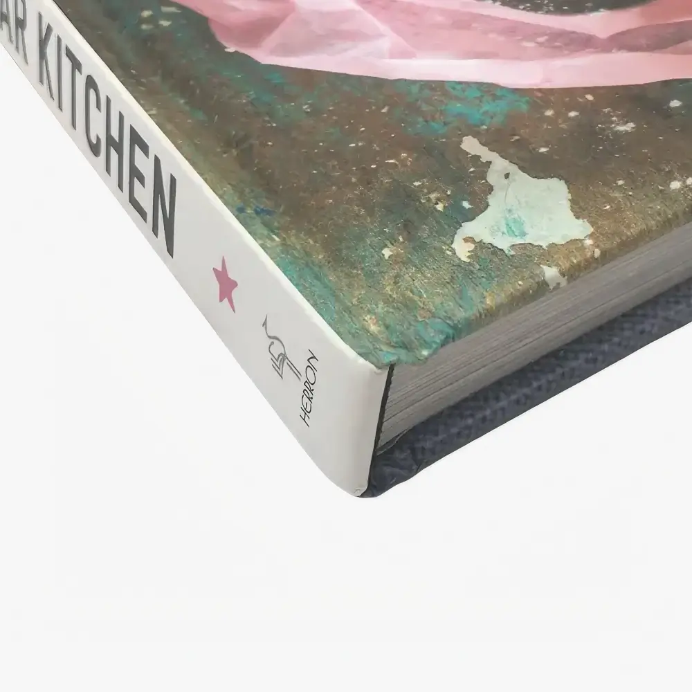 Durable binding for paperback softcover and hardcover books with secure pages and covers