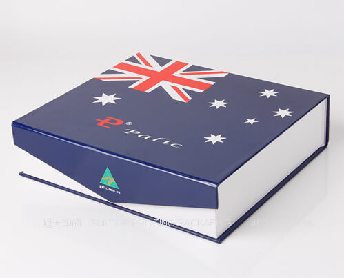 Book-style rigid gift box with magnetic closure and ribbon pull — perfect for cosmetics and accessories packaging.