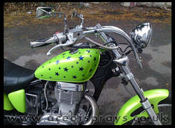Suzuki Savage pearl green blue stars