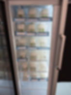 Cold storage fridge with labeled cultivar preservation containers