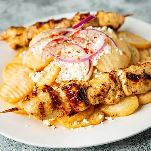 Greek fries with 2 chicken skewers