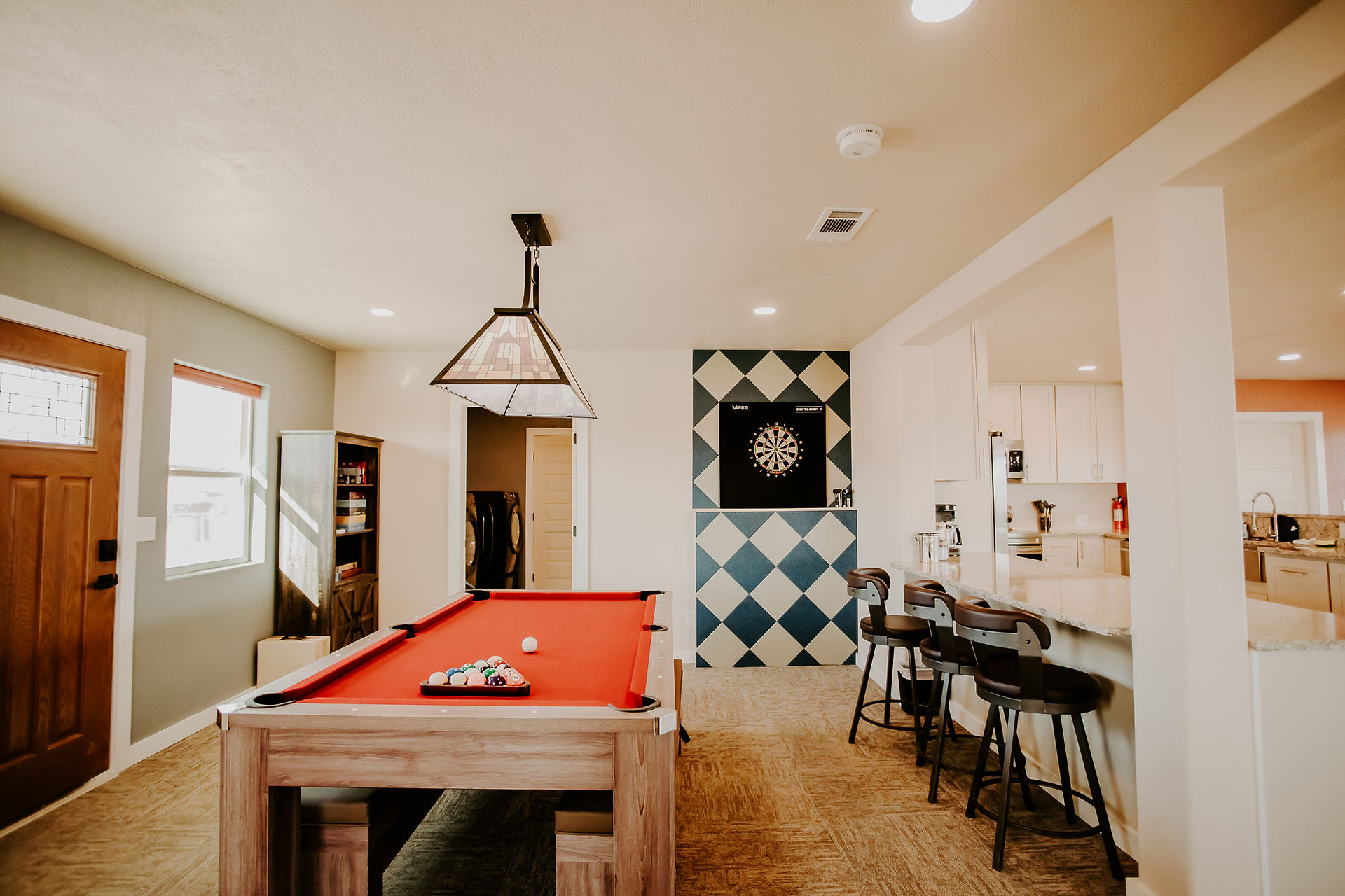 Cozy game room with pool table inside Abuelo Loco Big Bend Airbnb in Terlingua, Texas