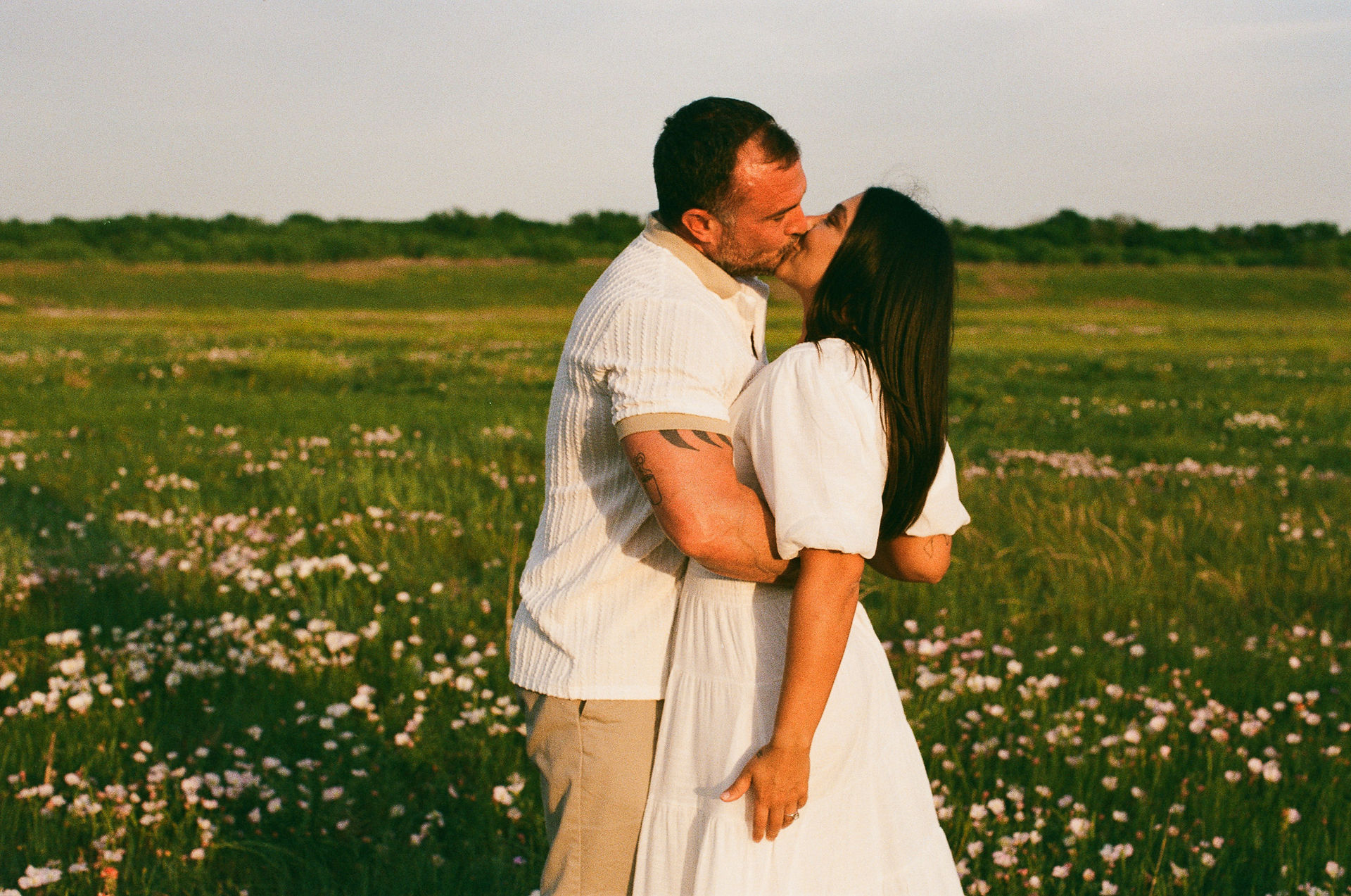 film photo of a couple kissing