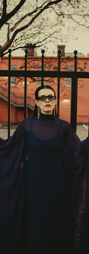 Close-up of model’s blue dress details during Downtown Memphis editorial fashion session.
