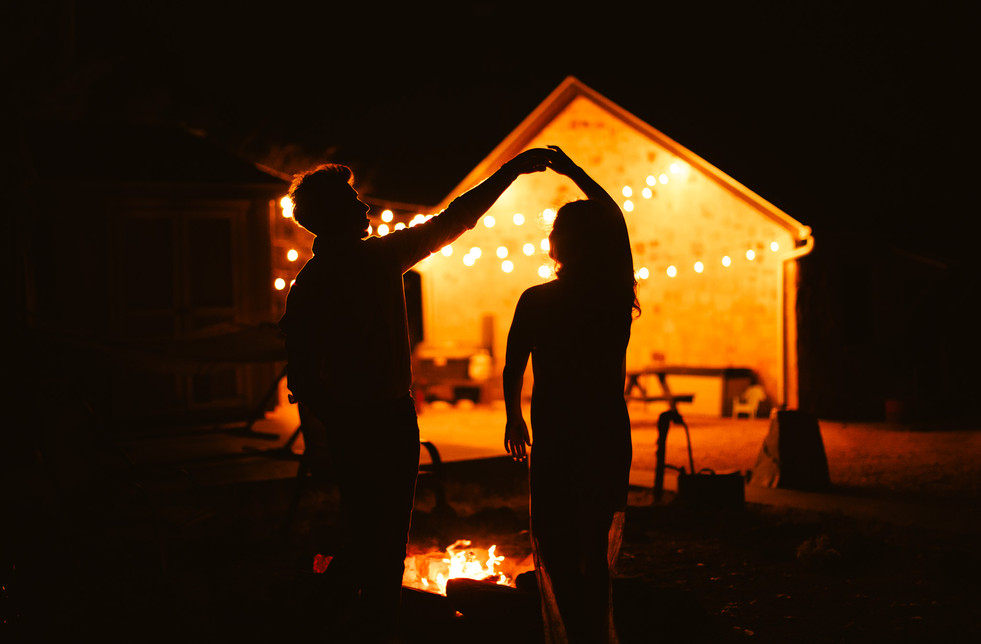 silhouette photo of couple dancing in the moonlight