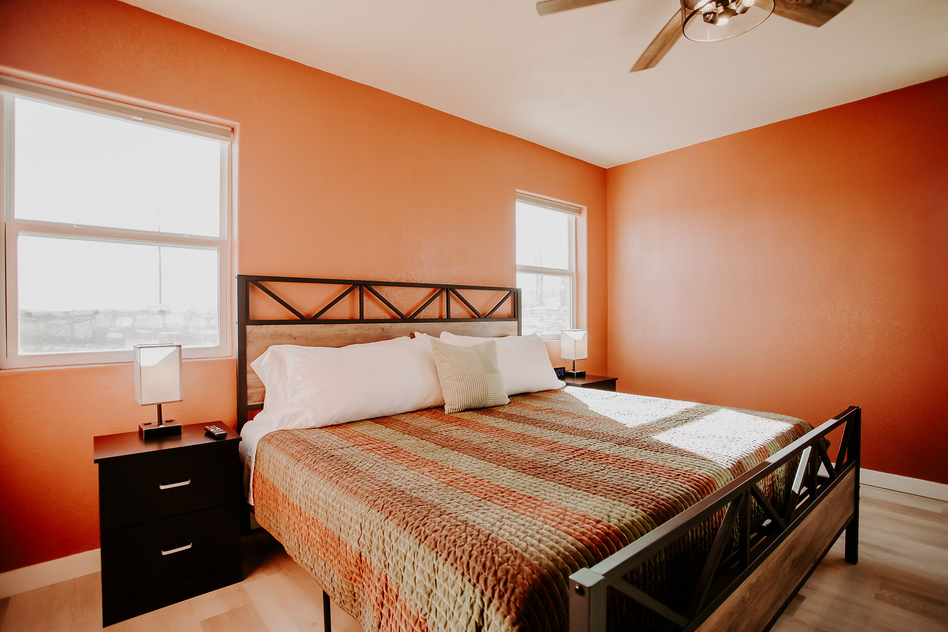 Warm minimalist bedroom at Abuelo Loco Big Bend Airbnb in Terlingua, Texas