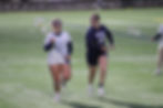 First-year Rhyan Pitari moves the ball up the field in a game against Suffolk University.
