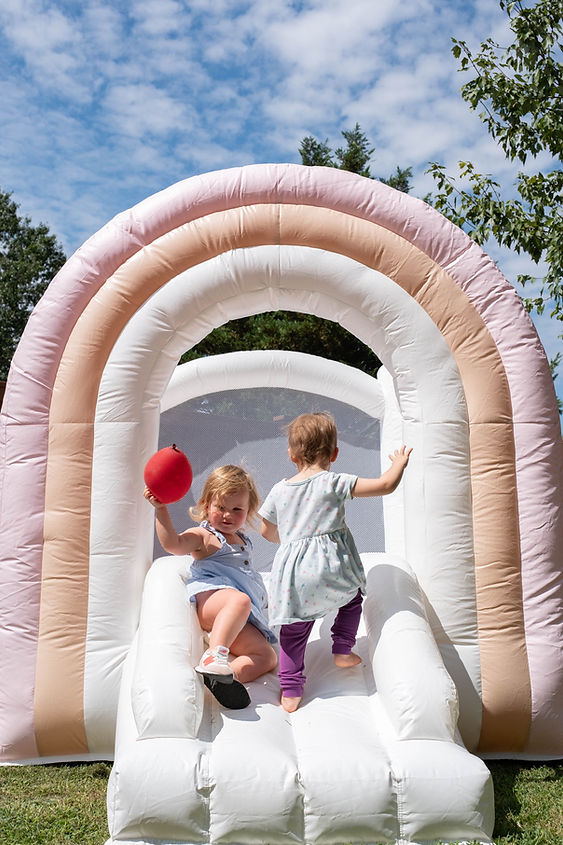toddlers in mini luxury bounce house_edited.jpg