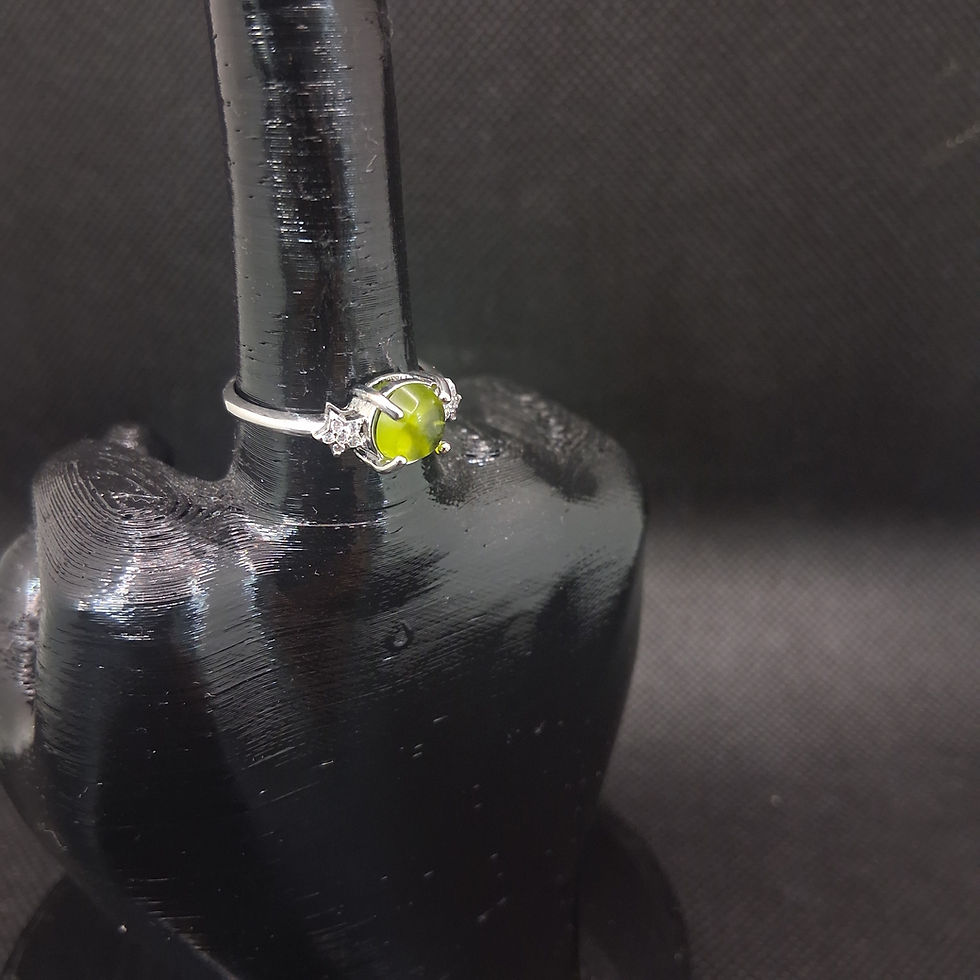 Thumbnail: Peridot cabochon ring