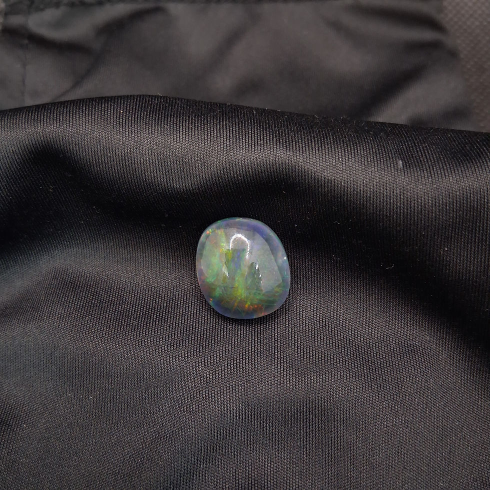 Thumbnail: Ethiopian black opal for display.