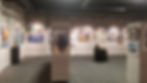 art gallery with canvas painting drawing and photography in the main erickson gallery in the prairie arts center in north platte nebraska