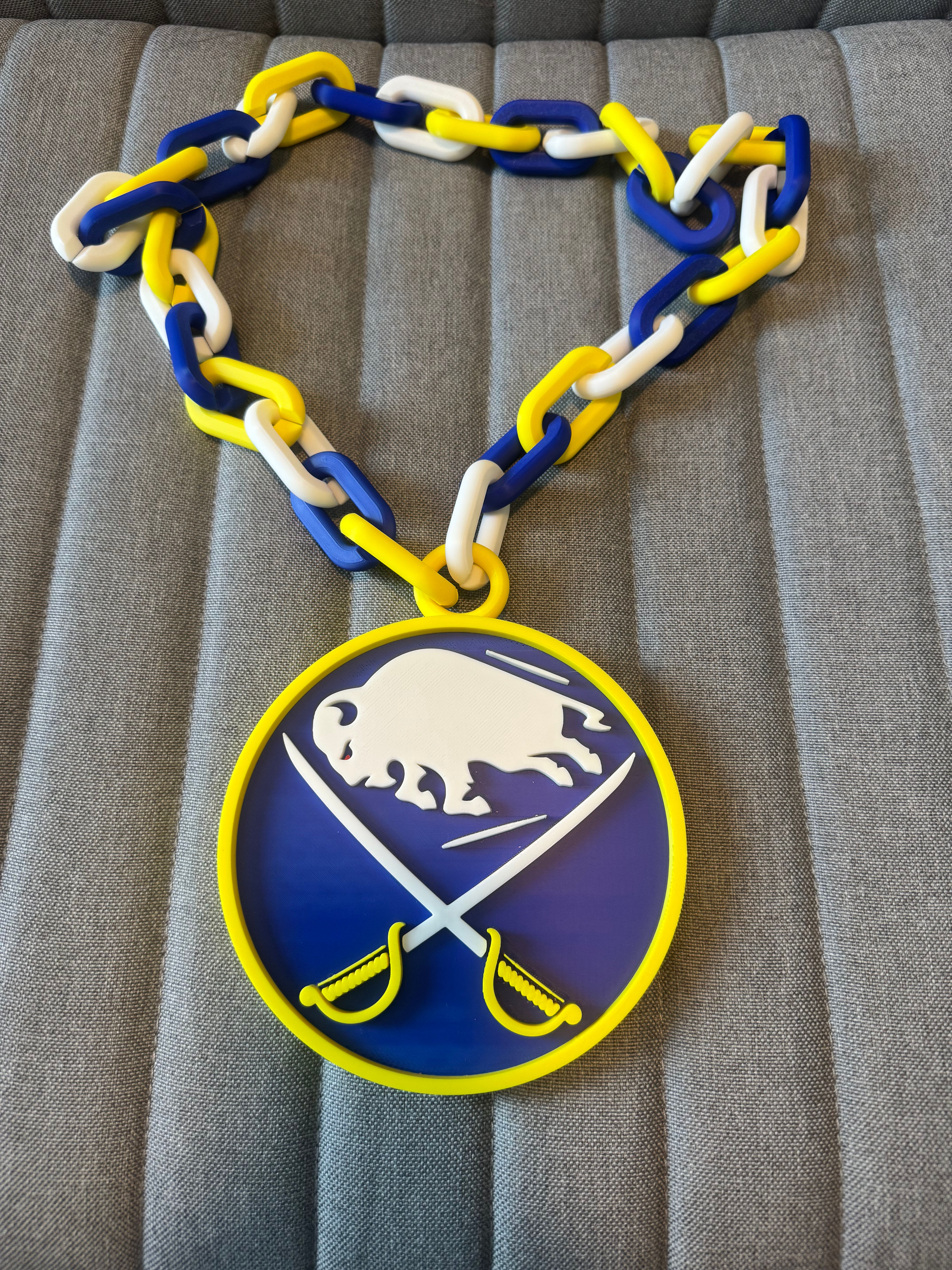 Blue and gold Buffalo pendant