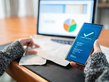 Student using budgeting tools to plan education financing and scholarship preparation