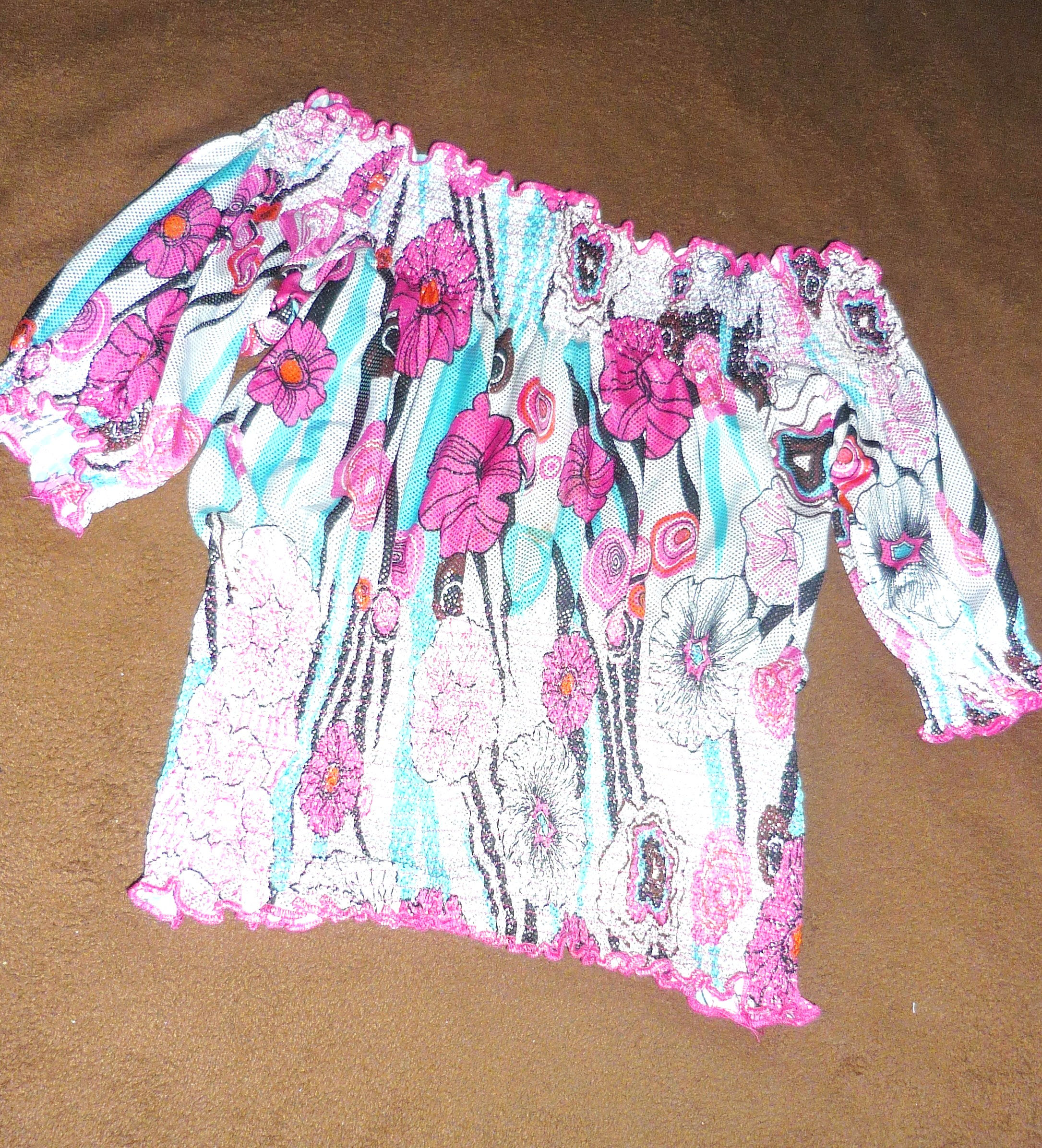 Blusa a la Cintura con manga corta.