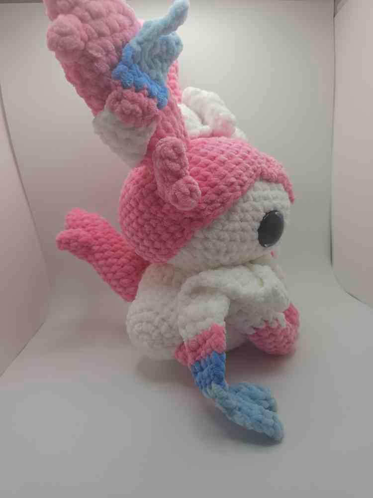Pink and white Amigurumi Evolving Companion Plushie