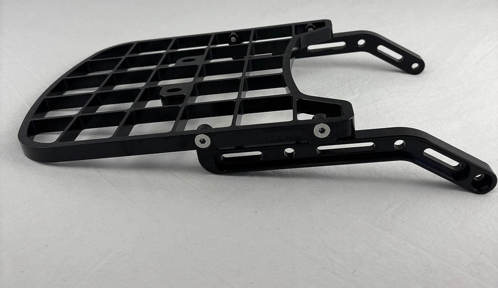 Anodized aluminum DRZ400 luggage rack cargo bracket viewed from the top angle to show the mounting surface.
