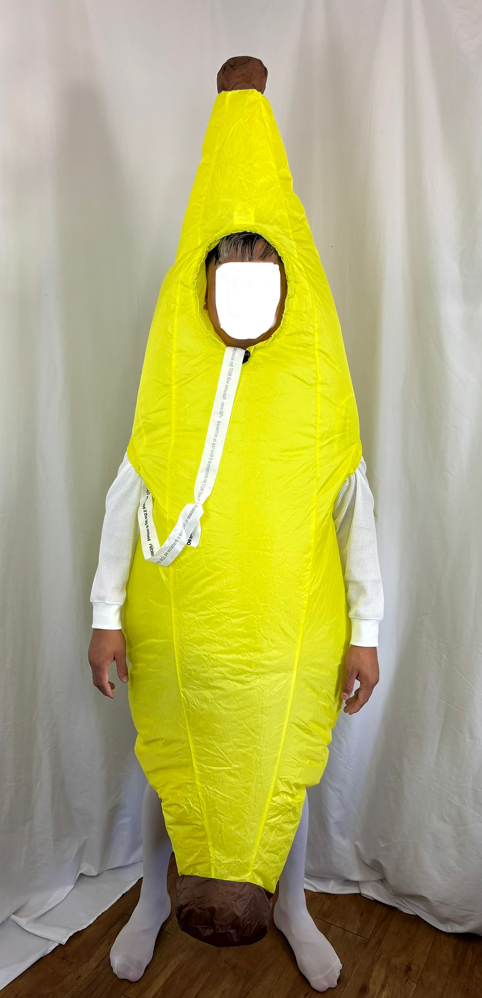 Adult wearing the fully inflated Rubies Inflatable Banana Costume showcasing its full height and fit.