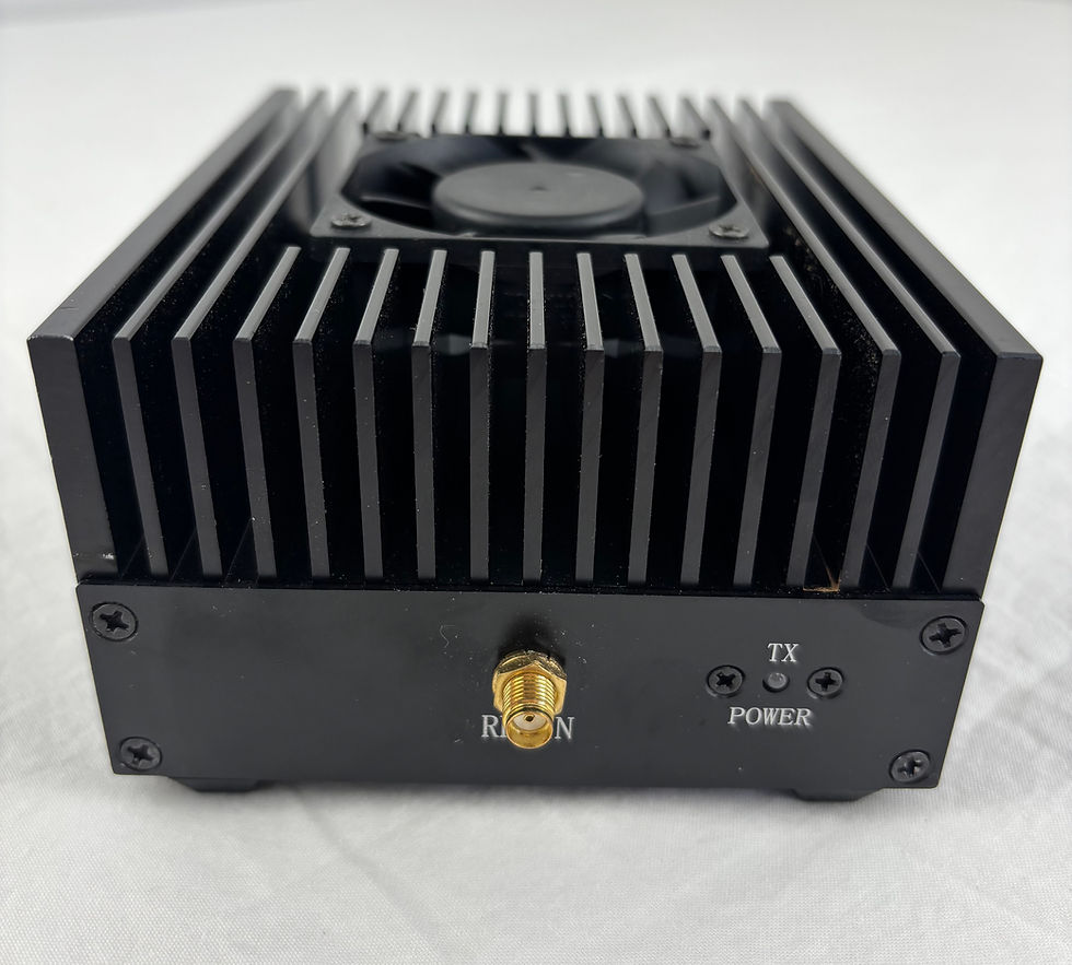 Front view of the black aluminum 80W UHF digital RF power amplifier showing the dual-color LED indicator.