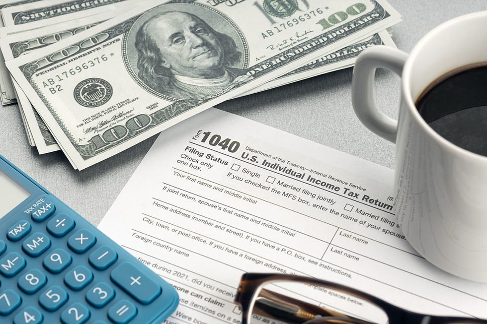 tax refund with money, a calculator and coffee