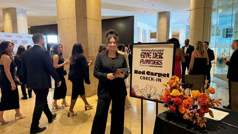 Professional check-in attendant managing a red carpet event in San Francisco for XS Event Staffing.