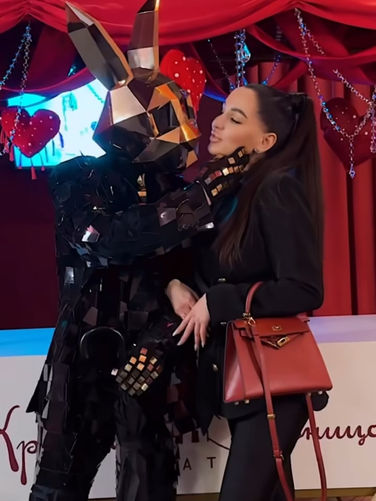 Los Angeles costumed performer interacting with guests during a themed corporate event activation. Featuring a custom character costume and immersive entertainment elements, the performer creates memorable photo opportunities, encourages attendee participation, and enhances the overall event experience.