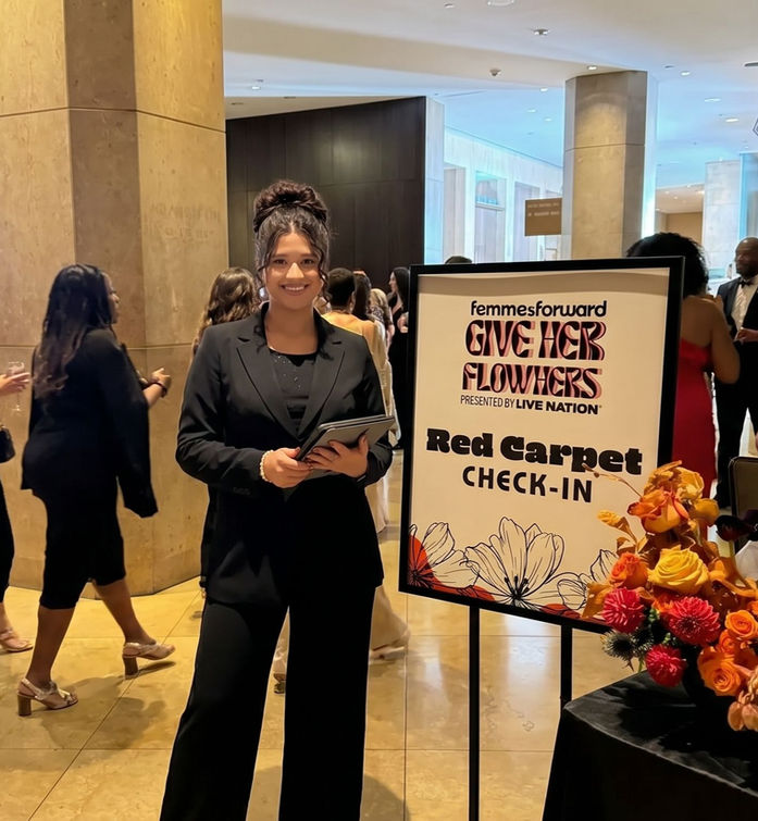 Check-in attendant in San Francisco managing red carpet guest registration, event check-in staff assisting arrivals, guest list coordination and front-of-house event staffing San Francisco