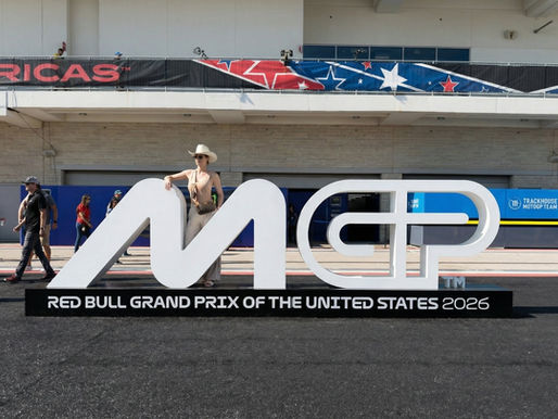 MotoGP Grand Prix venue with branded activation showcasing large-scale sports event staffing environment