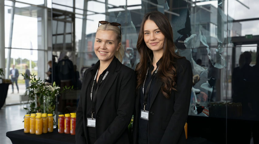 Registration staff managing attendee welcome and guest check-in at a Los Angeles business event, supporting conference registration, badge distribution, and front desk coordination for corporate event operations in LA