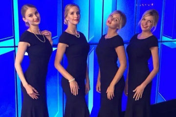 Los Angeles model hostesses welcoming guests at the entrance of an upscale corporate event. Dressed in coordinated attire and positioned at the arrival area, the hospitality team supports guest check-in, wayfinding, VIP arrivals, and creates a polished first impression for attendees.
