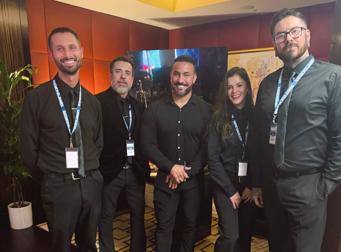Professional event servers supporting a VIP reception at a Los Angeles hotel, assisting with guest hospitality, beverage service, and private event operations for executive gatherings, sponsor events, and high-profile corporate functions.