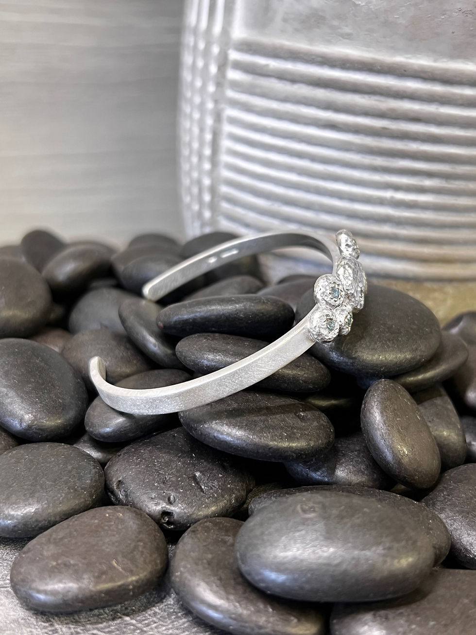 Thumbnail: Silver pebble open bangle with Blue Topaz