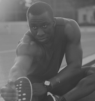 Athlete Stretching Legs_edited_edited.jp