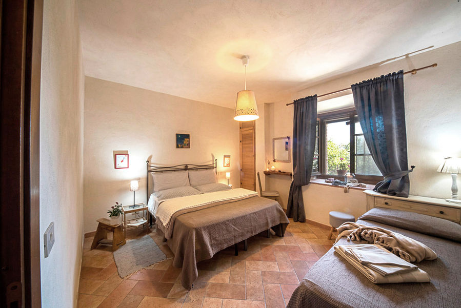 Stanza da letto appartamento agriturismo Poggio ai Legni Toscana
