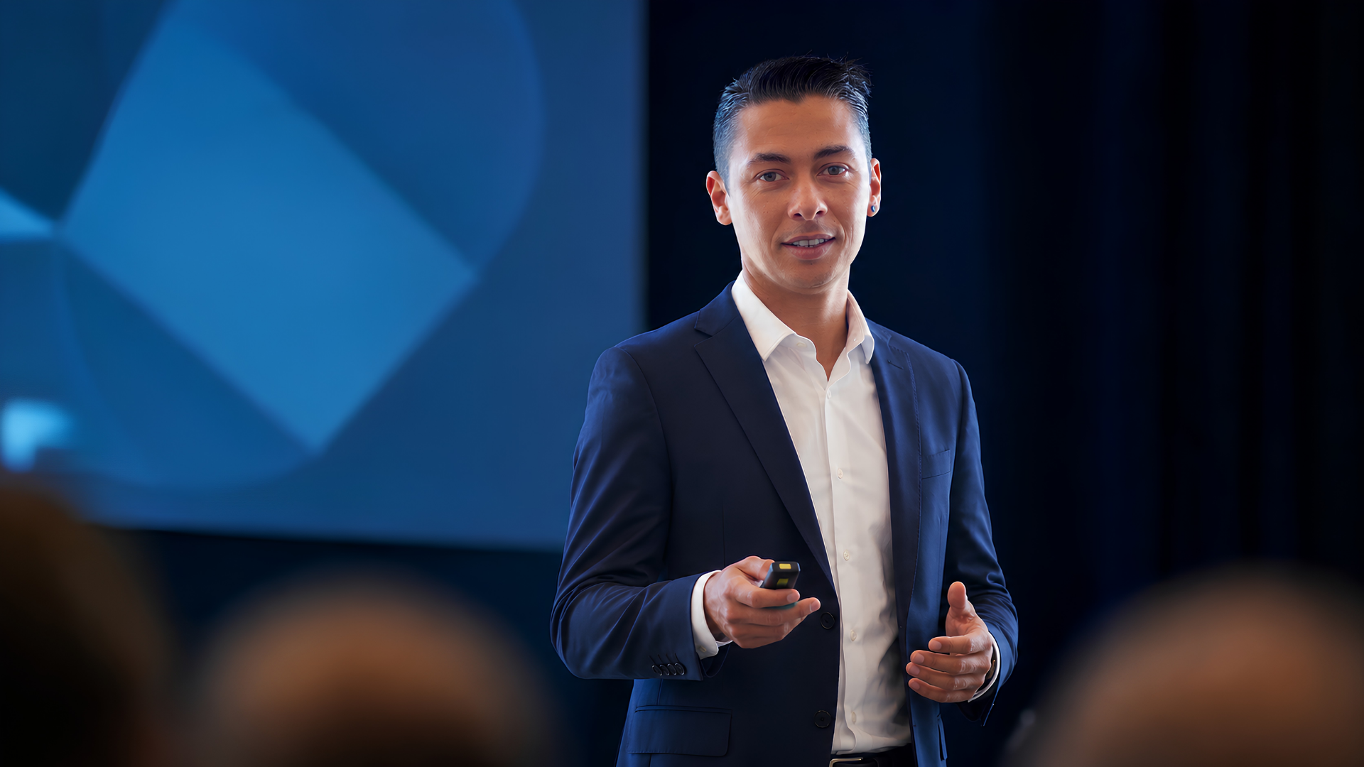 Soufiane Boudarraja presenting a keynote on stage