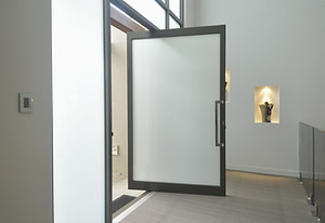Black-Aluminium-Pivot-Door-with-obscure-