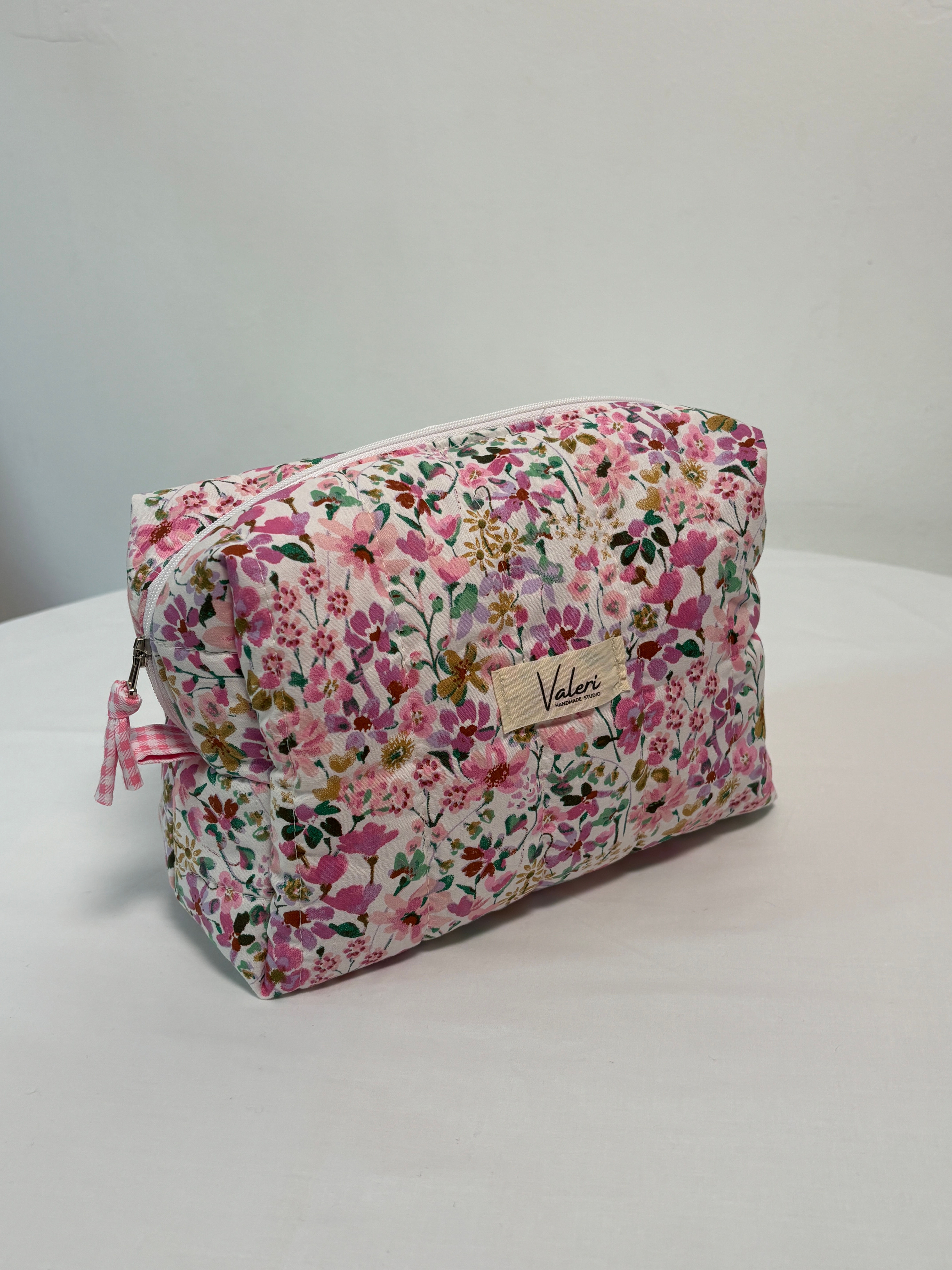 תיק איפור פרחוני סגול