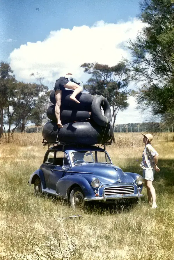 1988 Bringing inner tubes back to camp atfer blowing them up at a local garage 