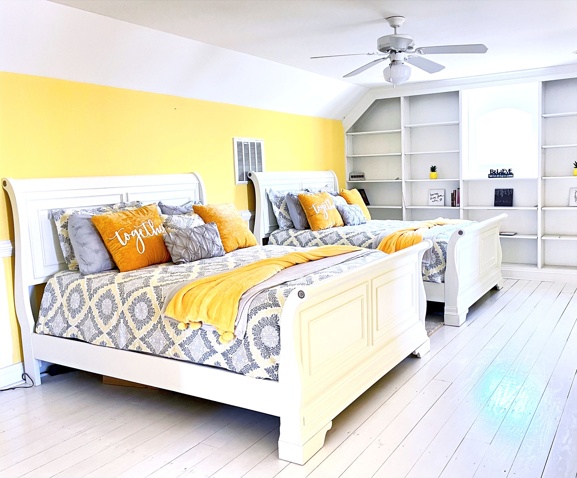 two queen beds in the penthouse room overlooking the pool and Potomac River