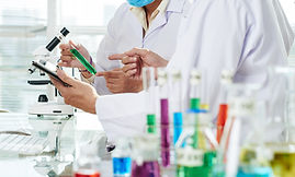 chemists-carrying-out-experiment.jpg
