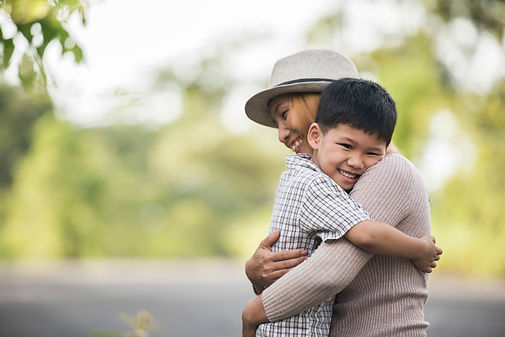 portrait-mother-son-happy-cuddle-together-park-family-concept.jpg