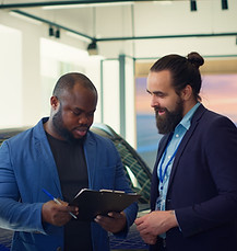 car-showroom-agent-suggesting-clients-extra-features-buy-asks-signature.jpg