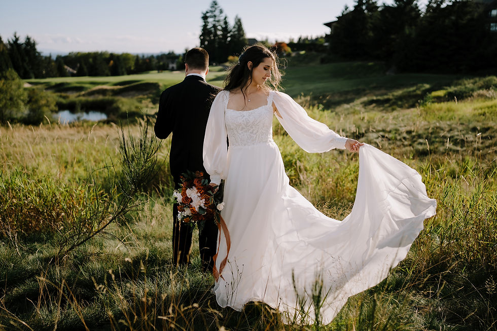 Golf Cart Adventure: Bride and groom riding in a golf cart with their personal driver, heading to scenic photo spots at Westwood Plateau Golf & Country Club.