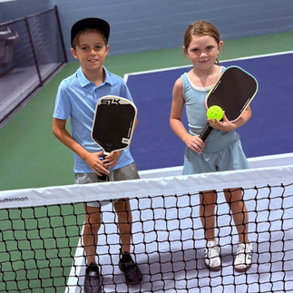 kids playing pickleball