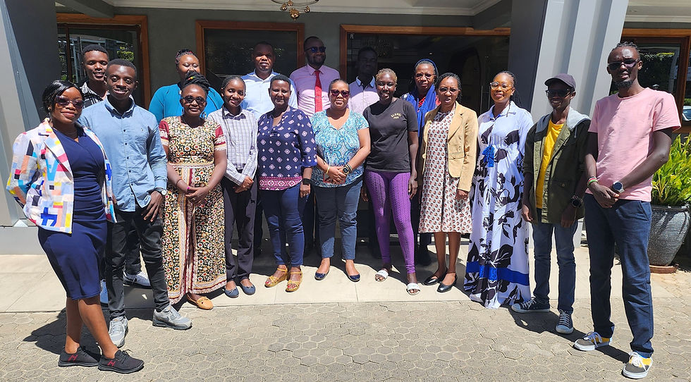 Meeting participants pose for a photo shortly after the training.