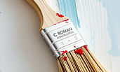 a paint brush with name C Roman Construction